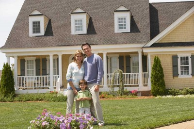 Family in front of House